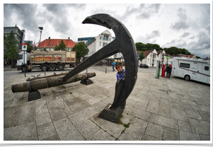 M and the ships anchor.